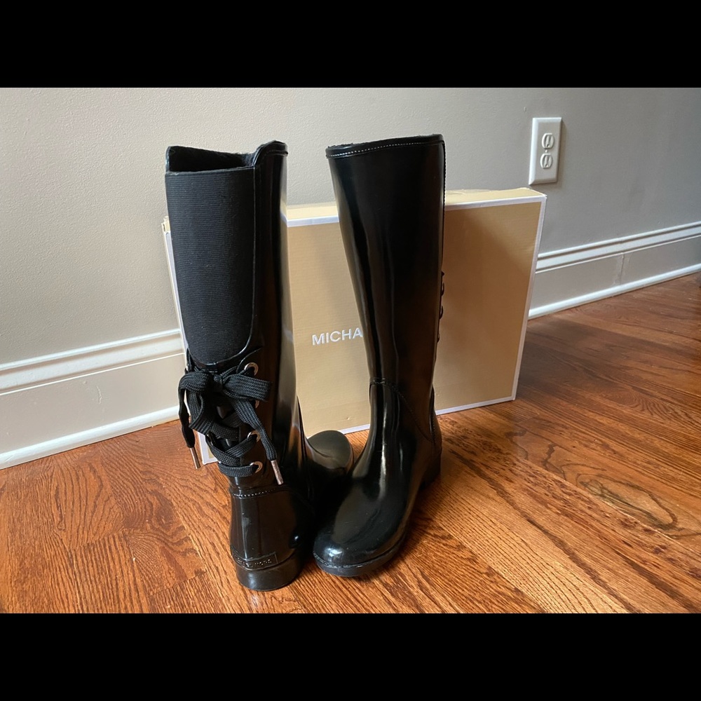 Michael Kors tall lace up rain boots.